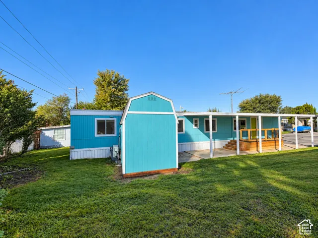 backyard view from south east corner of the shed and covered porch