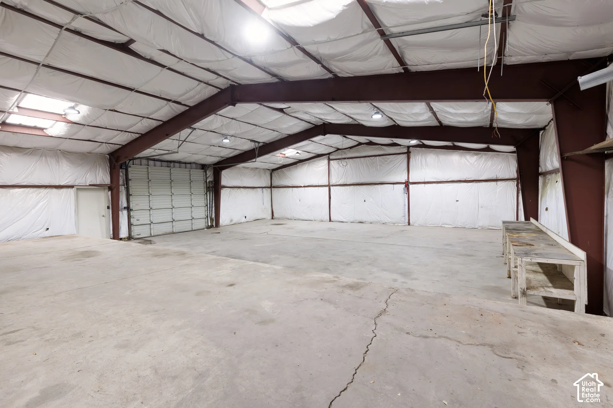 Loading area with dock and large storage or shop space