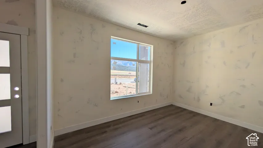 Front Room - large window, double door opening, and closet