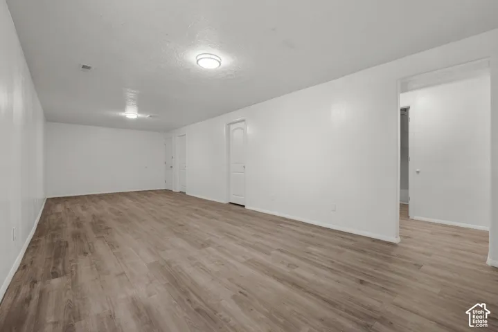 Large family-room, LVP floor and fresh paint