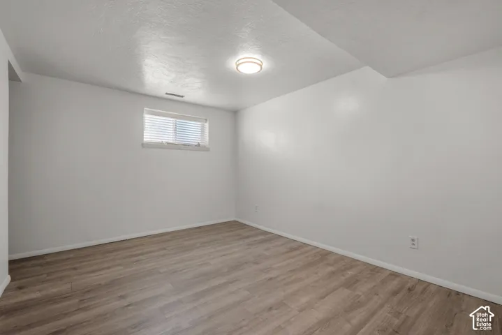 Large family-room, LVP floor and fresh paint