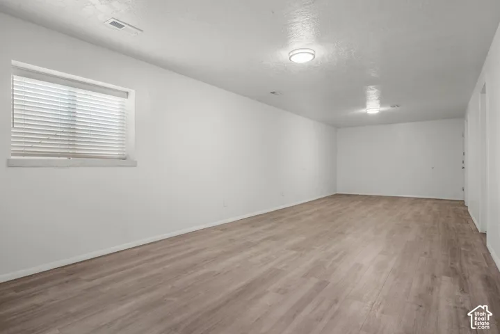 Large family-room, LVP floor and fresh paint
