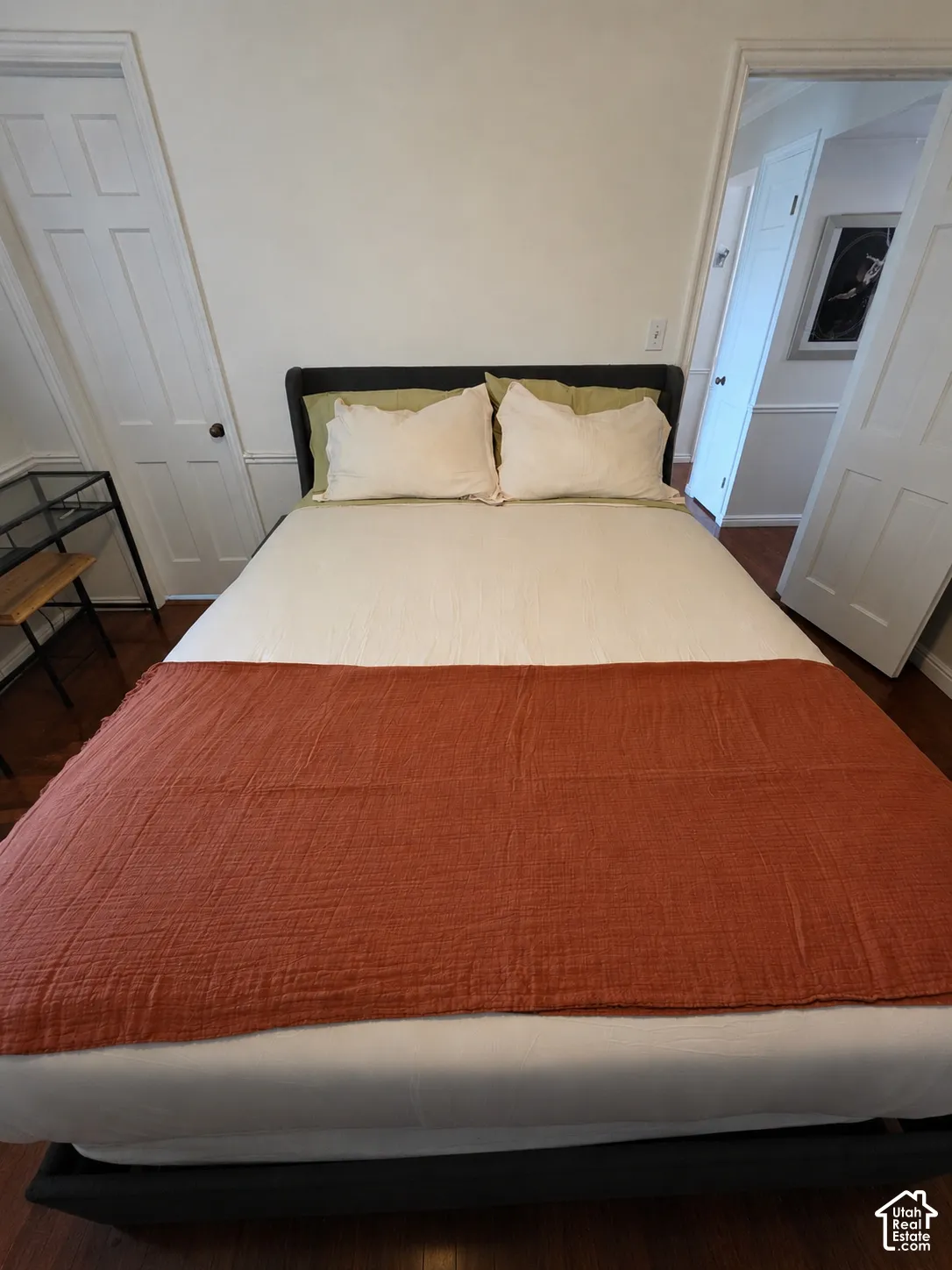 Laminate flooring, two-panel interior doors, and chair rail molding