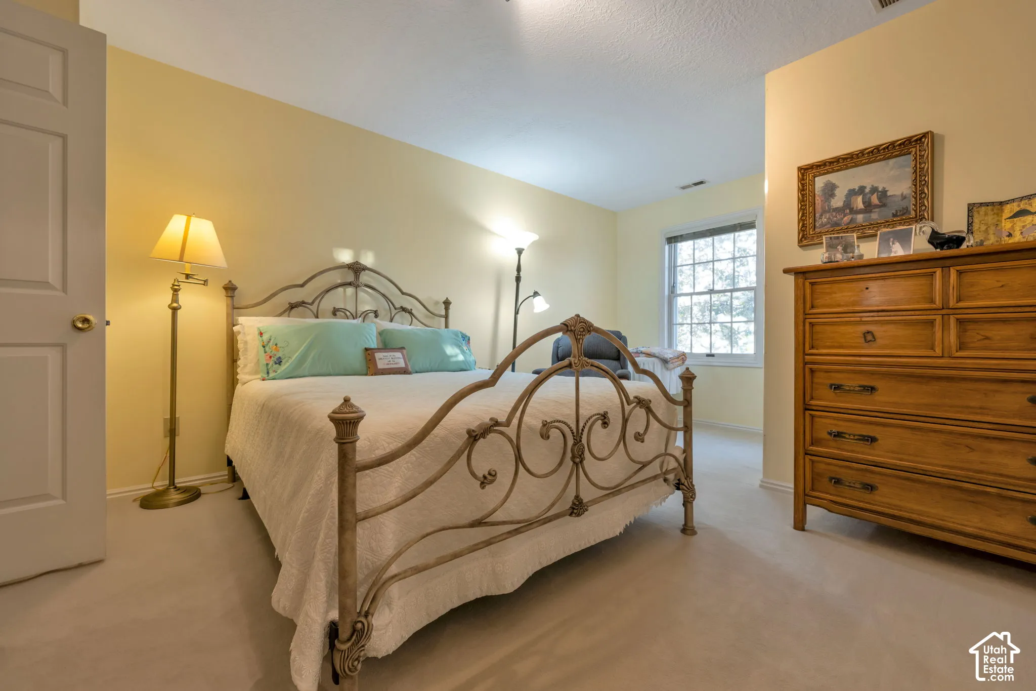 Bedroom two of 5, this bedroom has its own private  balcony and abundant closet space.