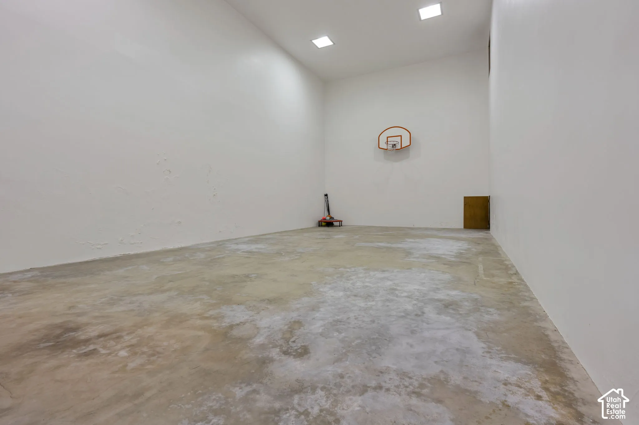 Indoor Pickleball/Basketball court (20'X40') and 2+ stories high, accessible from garage staircase and inside home.