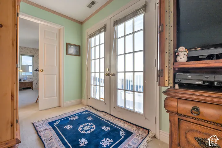 Four of 5, closeup of the double glass-paneled French doors with connection to the Primary Suit