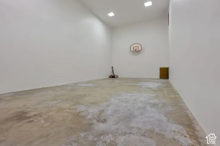 Indoor Pickleball/Basketball court (20'X40') and 2+ stories high, accessible from garage staircase and inside home.