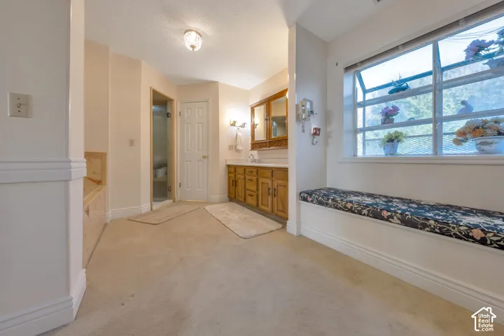 Primary Bath is huge, with separate water closet, shower, double vanity and window.