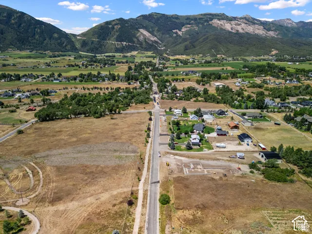 4100 N road has 2 small white cars at entrance of dirt road easement. The dirt road easement runs along side of home with green grass.Keep driving on dirt road to the property where you will find the Coldwell Banker sign & that's the property's location