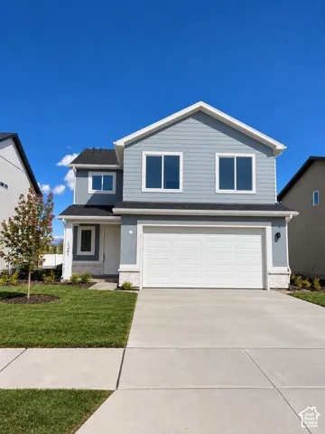 Front yard landscaping is included! ? This photo is a digital mockup to show what the home may look like once the landscaping is complete. Actual landscaping may vary slightly from the rendering.