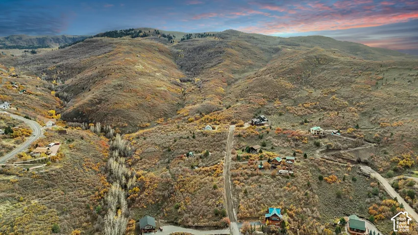 Aerial perspective featuring mountainous topography and expansive natural landscape