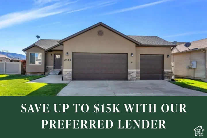 Single-level exterior featuring a stucco facade, stone veneer accents, a three-car garage, and a concrete driveway
