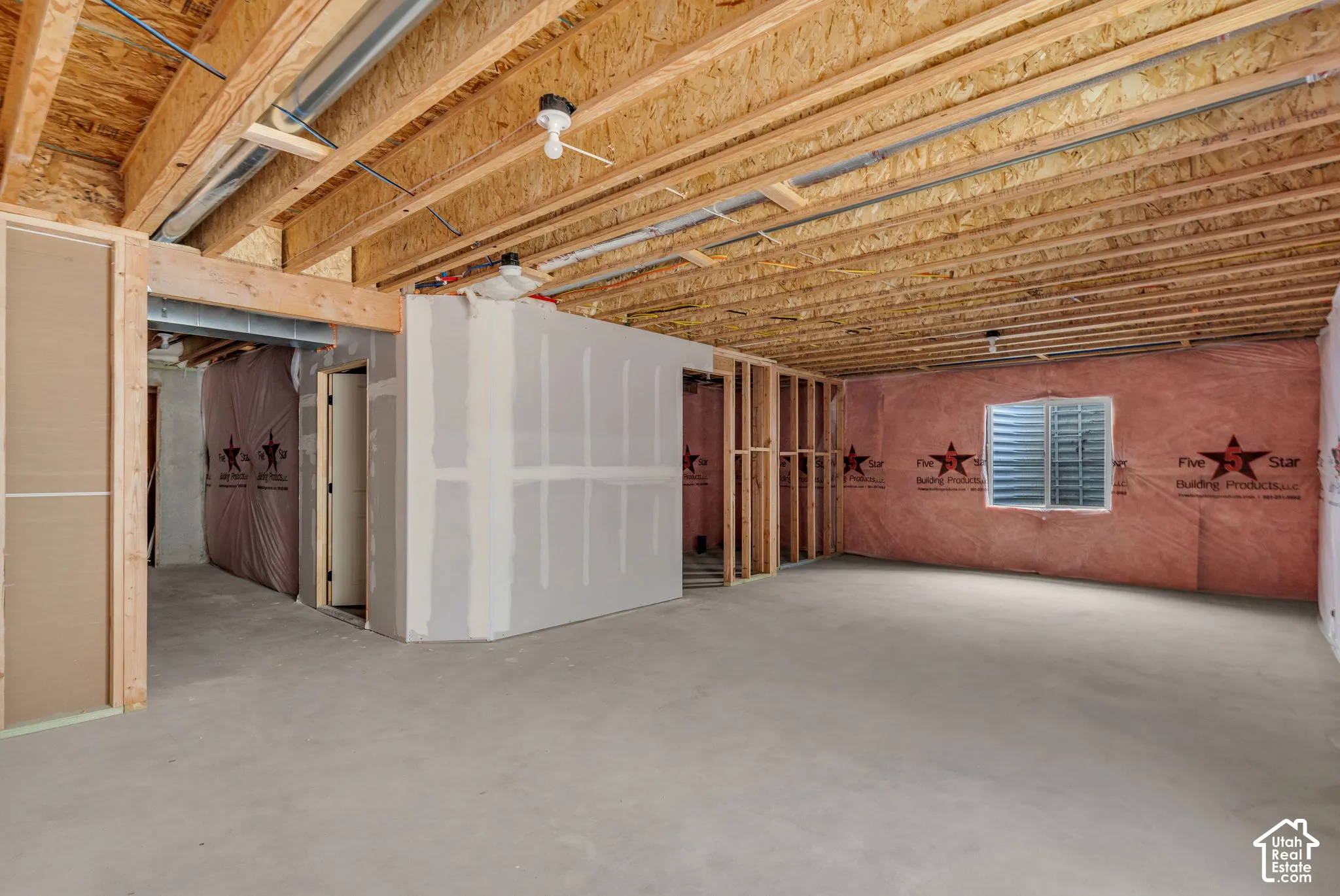 Unfinished basement with potential for large family/game room, full bathroom and one bedroom.