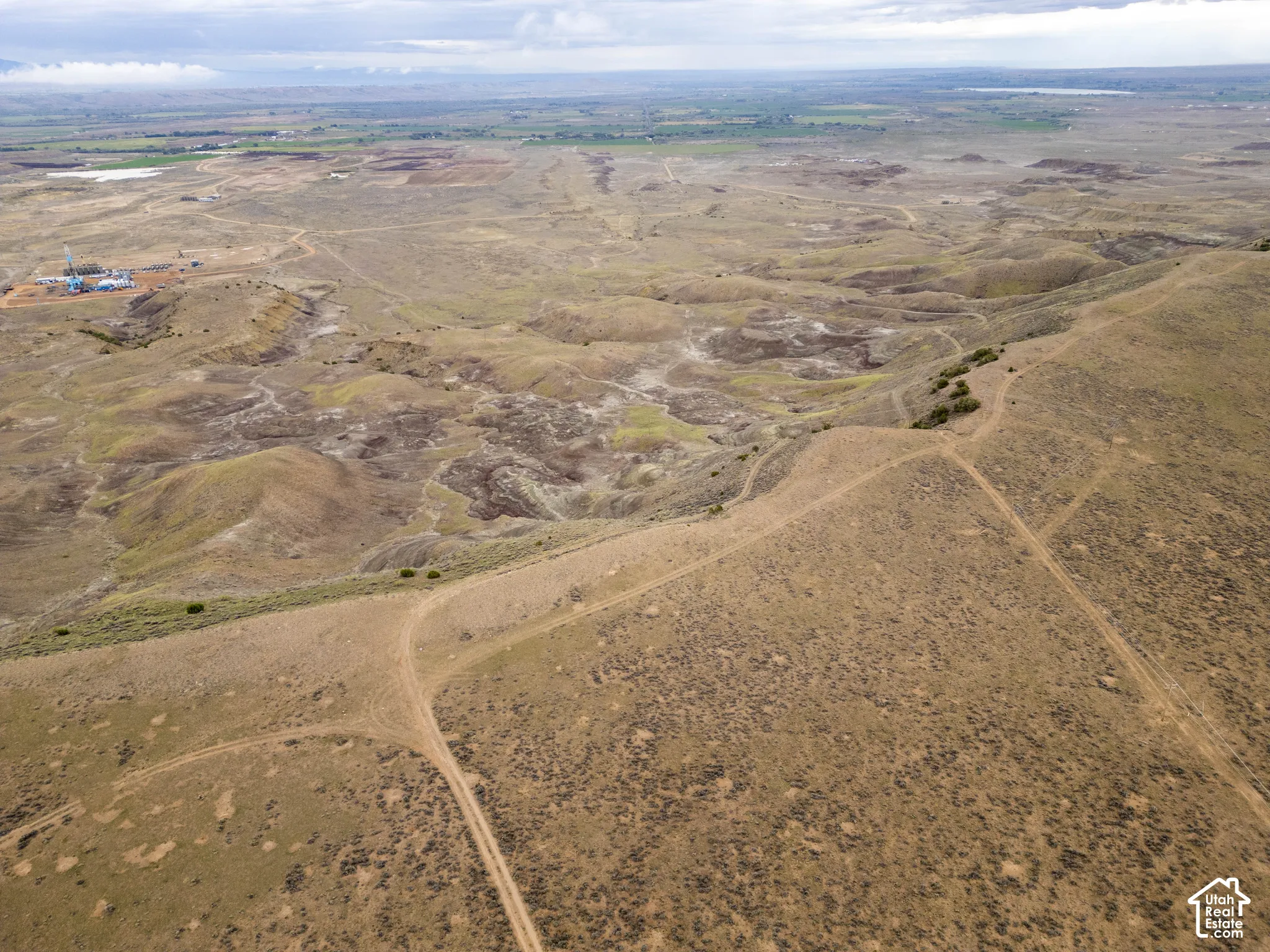 Expansive acreage featuring rugged topography, natural desert landscape, and unimproved dirt trails