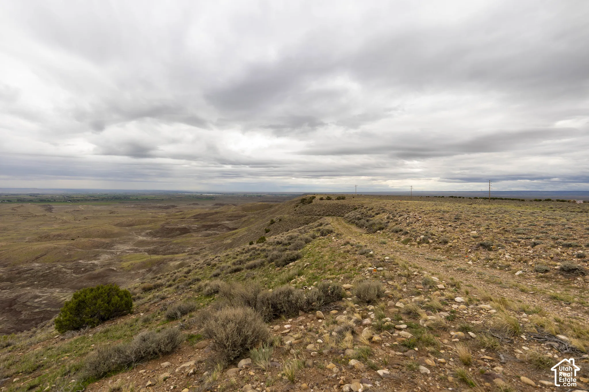 Expansive acreage featuring elevated topography, native scrub vegetation, rocky terrain, and panoramic natural scenery