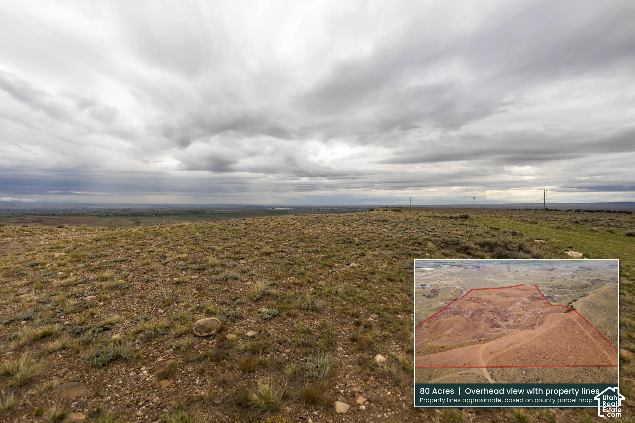 Eighty acres of open terrain featuring native grasses, low-lying shrubs, and rocky ground cover