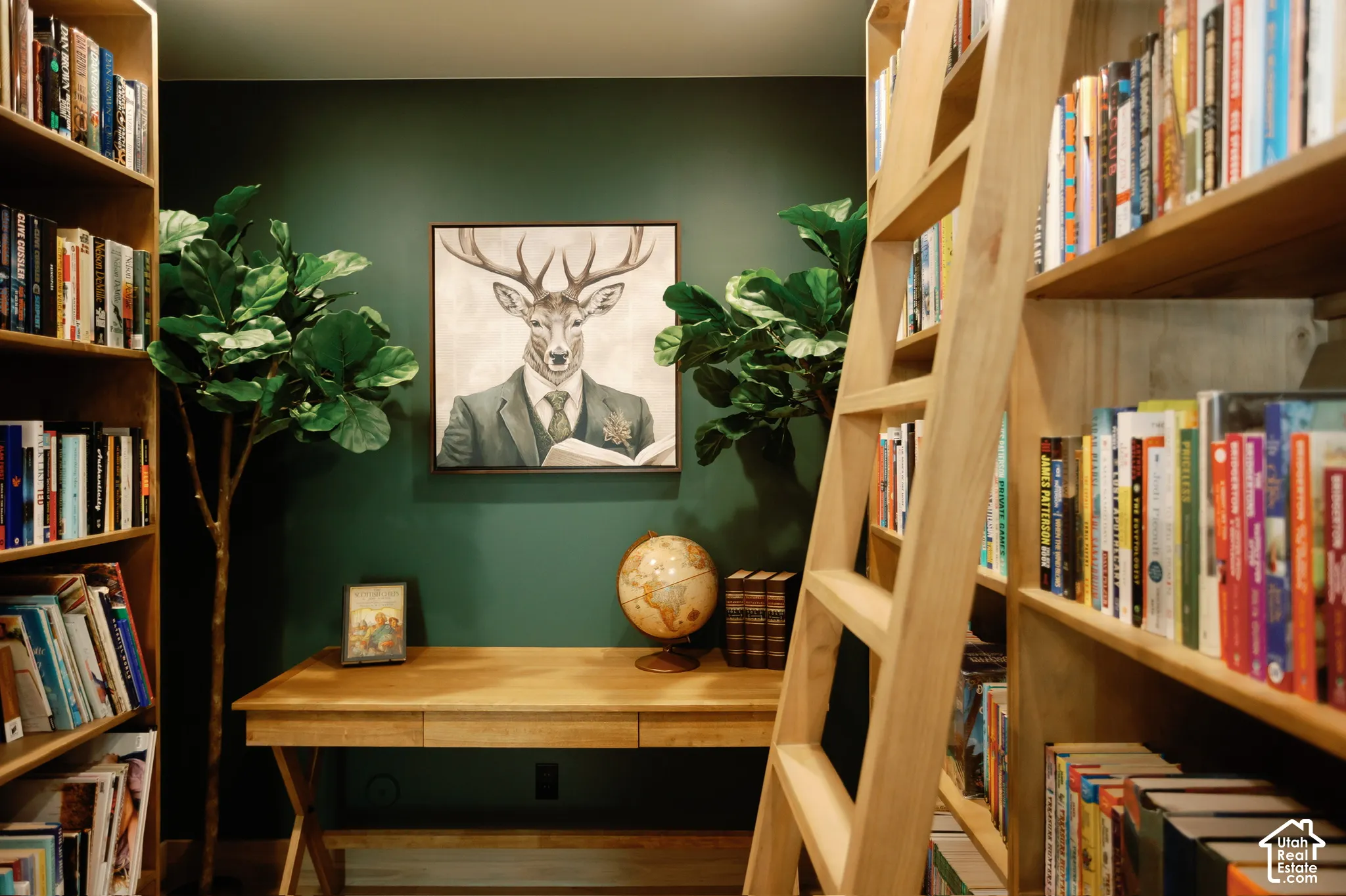 Floor-to-ceiling custom wood shelving with an integrated rolling library ladder