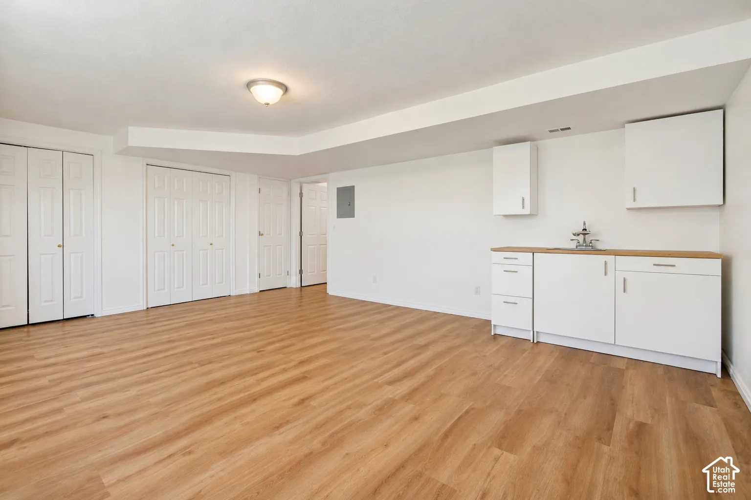 Basement bedroom #3 or multi-purpose room. Walk-out door located in this room.
