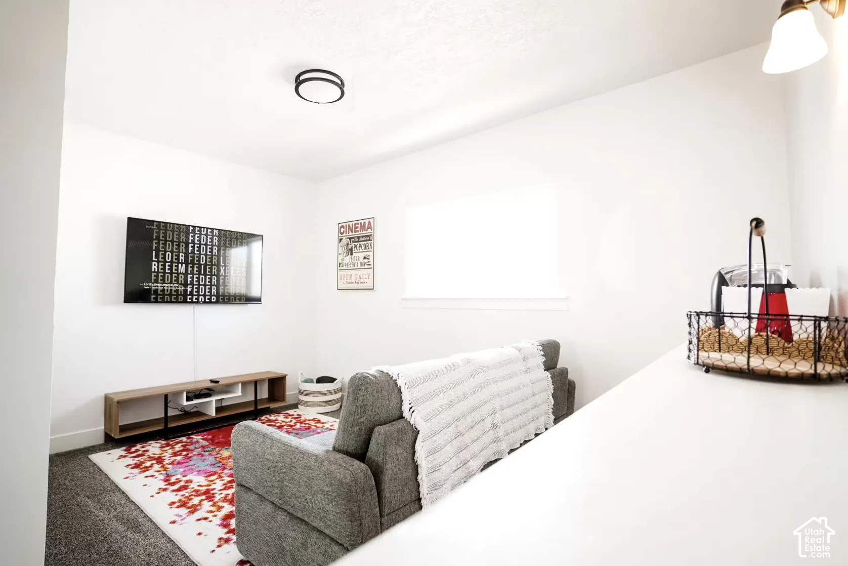 Interior room featuring neutral wall finishes, low-pile carpeting, and a flush-mount circular ceiling fixture