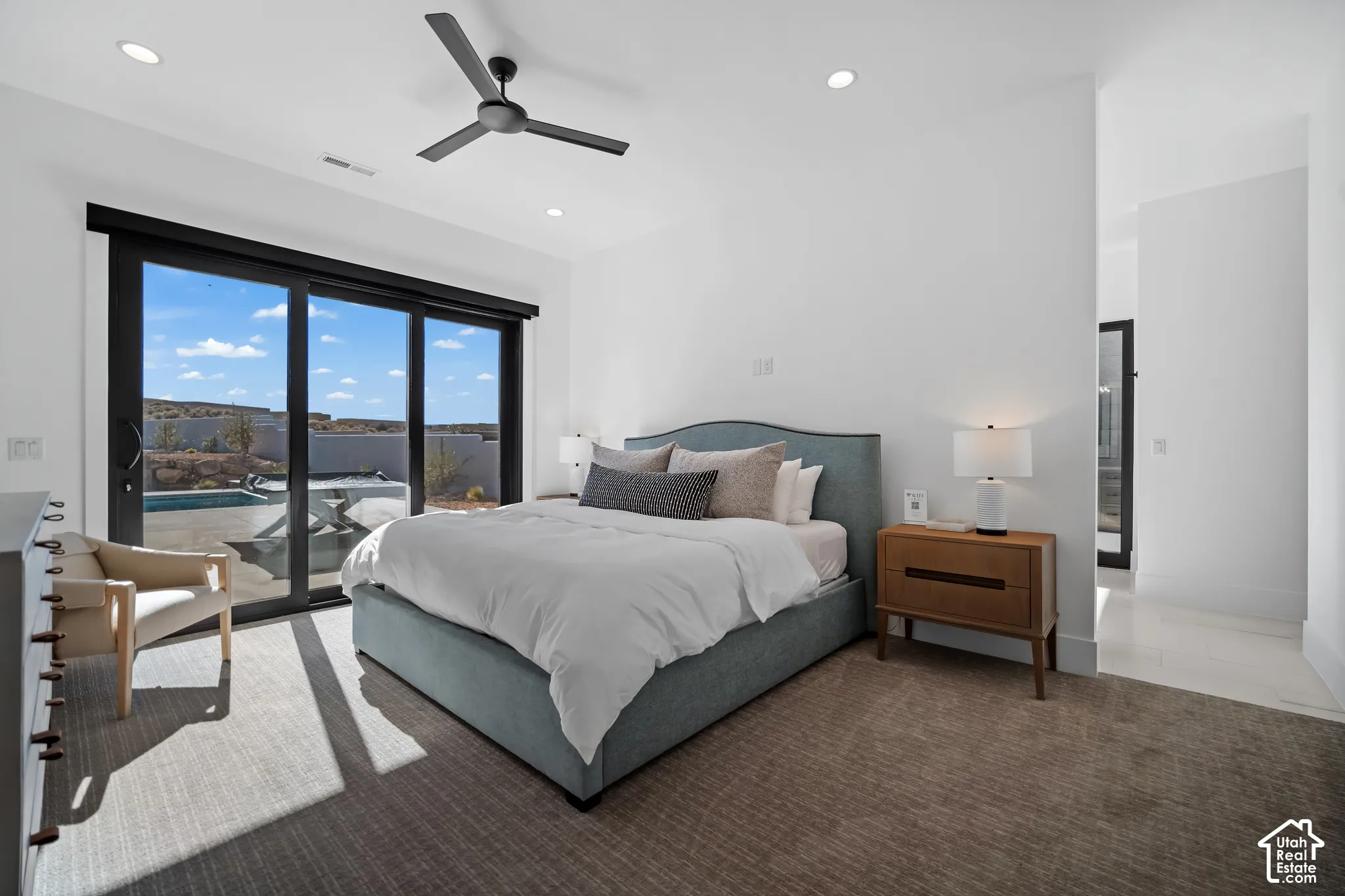 Second primary suite with sliding doors to the patio