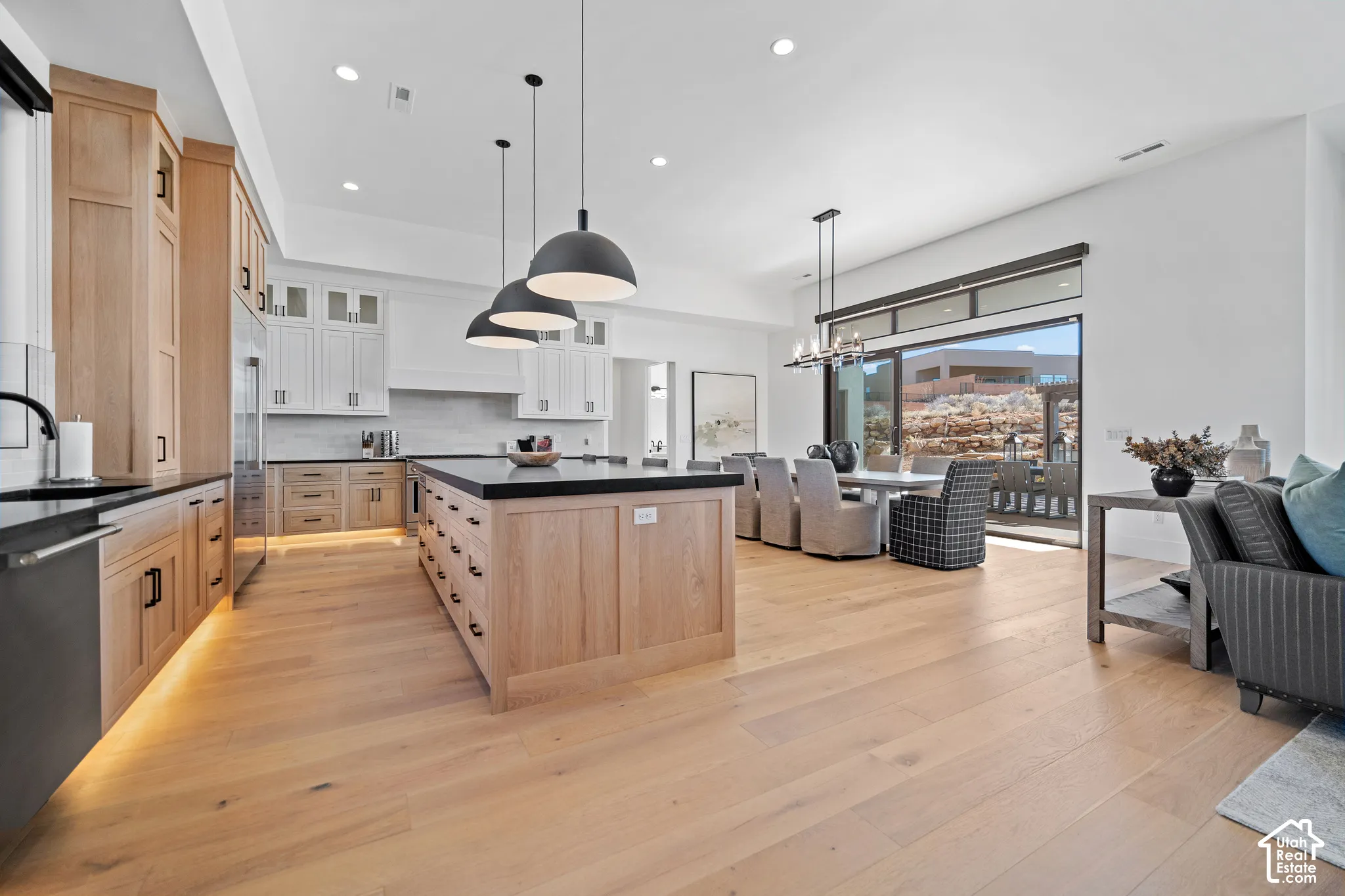 Kitchen island looking to the great room and red rock views