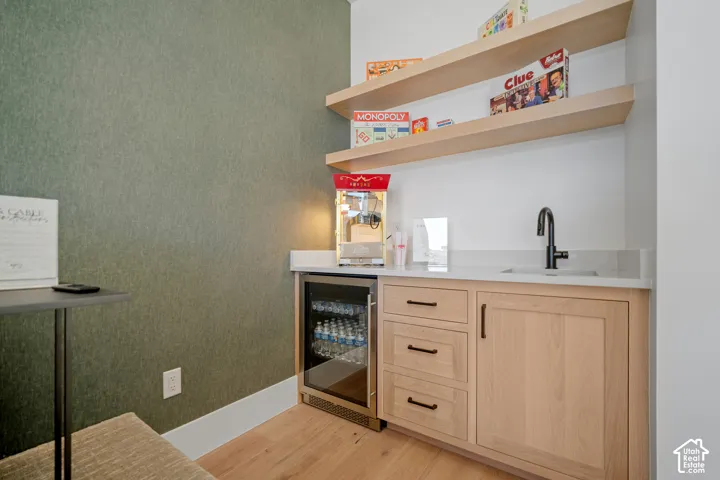 Theater wet bar with beverage fridge