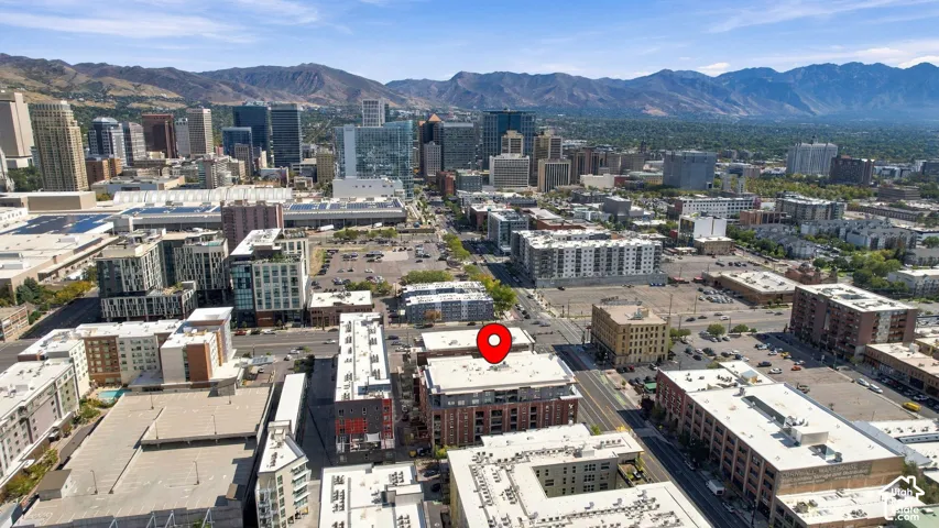 Expansive cityscape with mountains in the background