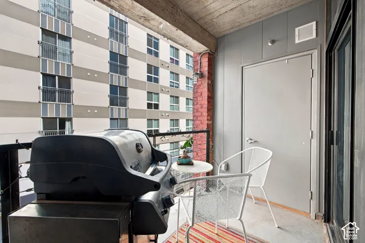Outdoor balcony with concrete flooring