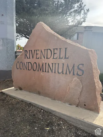 Natural stone monument sign featuring engraved lettering
