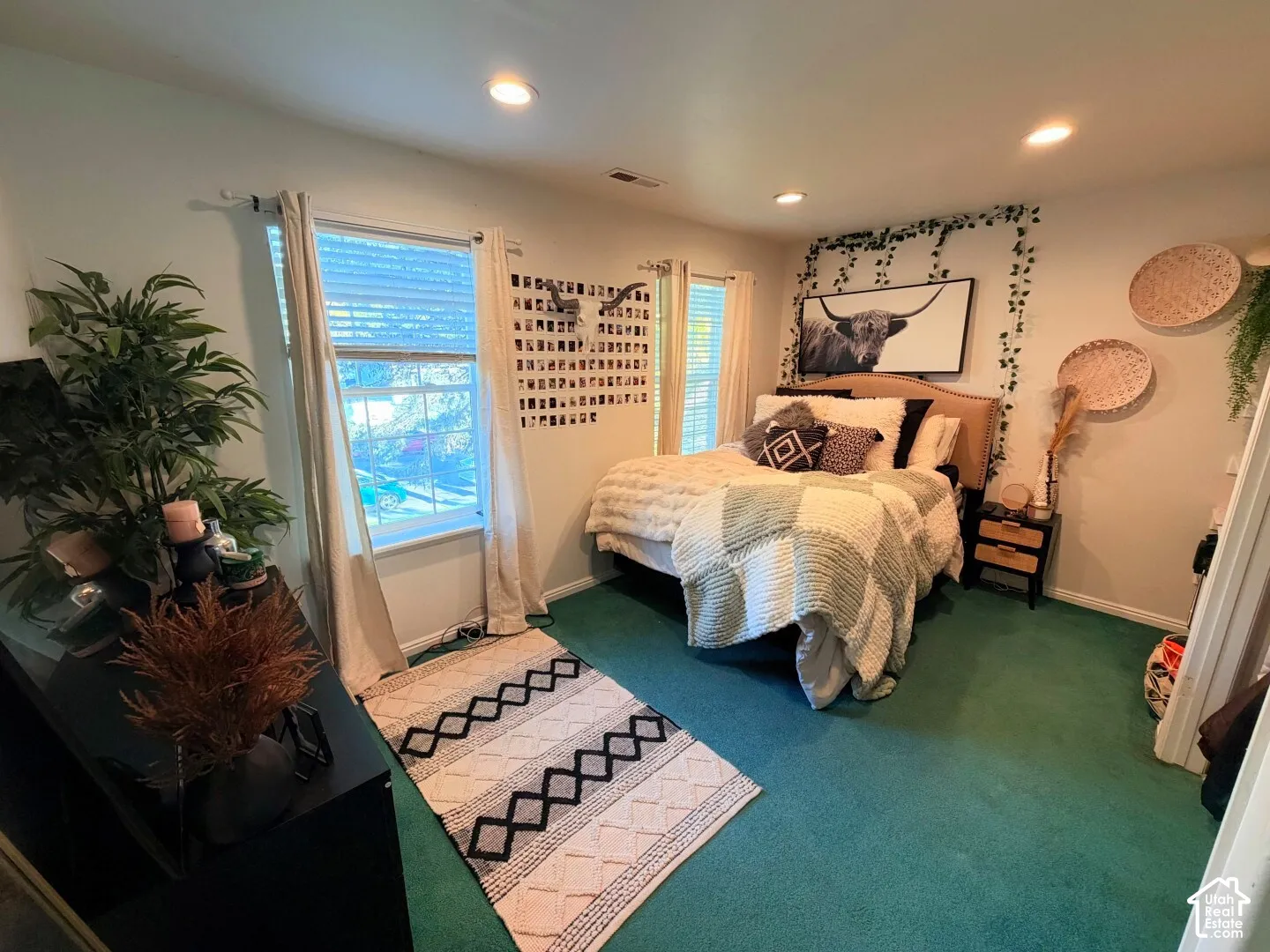 Bedroom featuring dual windows, recessed lighting, and wall-to-wall carpeting