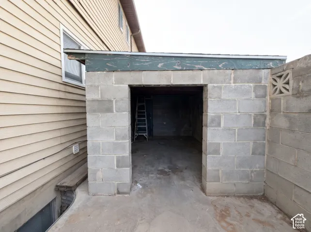 Concrete block exterior structure with flat roof and decorative concrete screen block detail