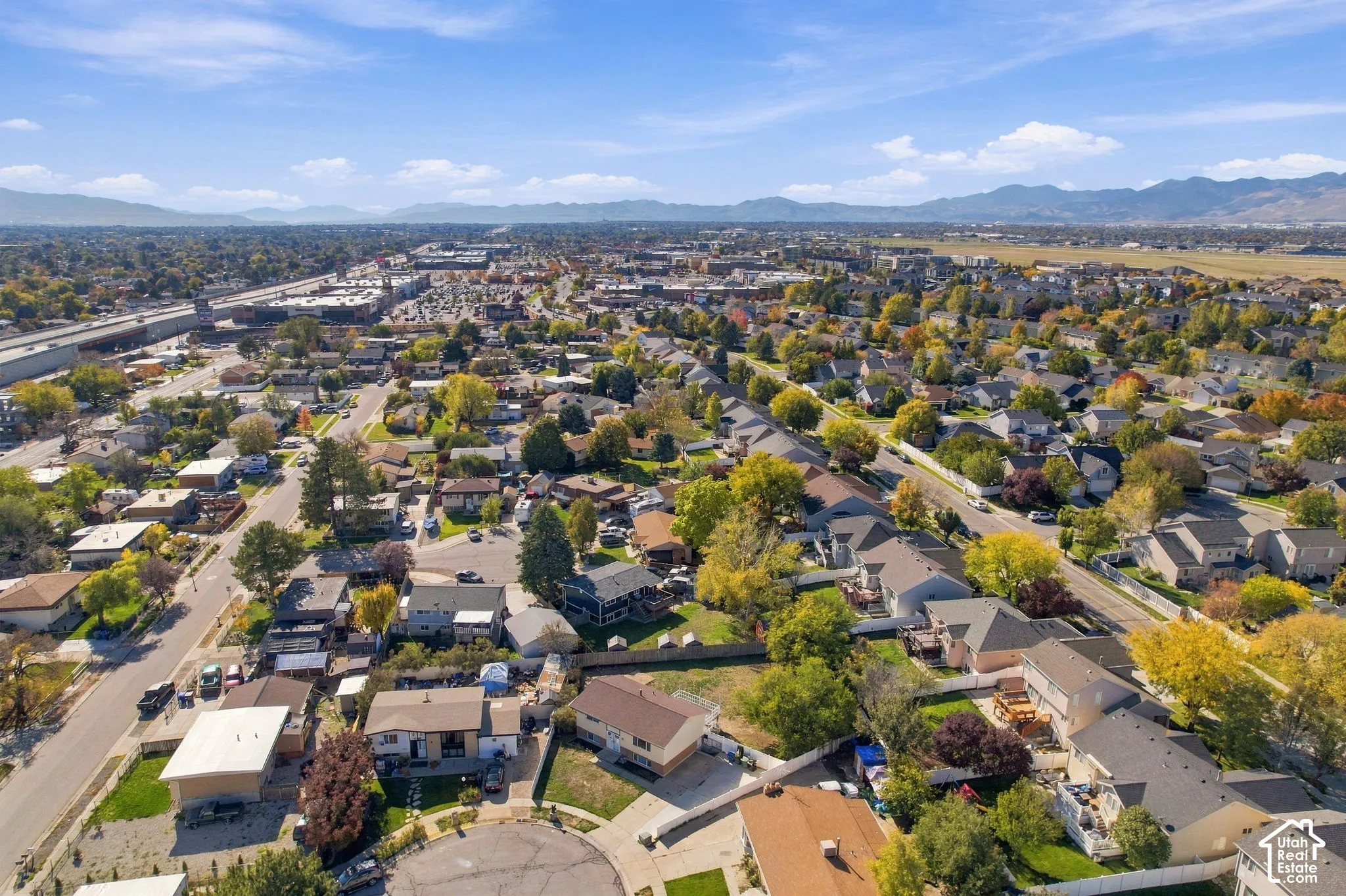 Aerial view of the neighborhood and nearby streets