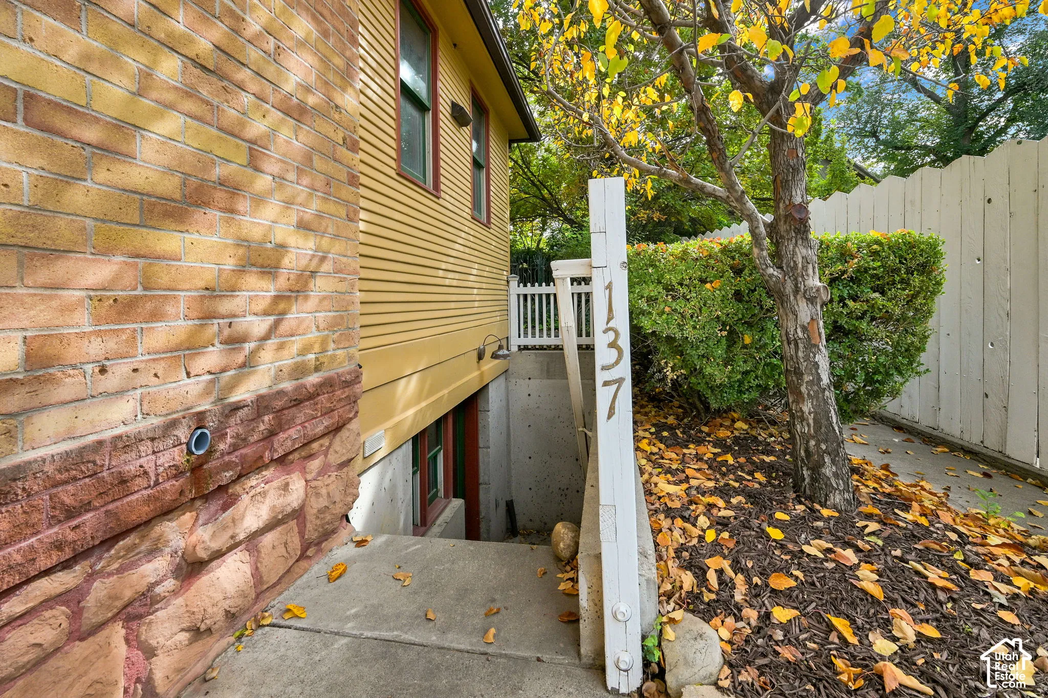 Side entrance into Basement Studio Apt with its own address.