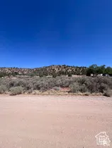 Expansive parcel featuring native desert vegetation, natural topography, and mountainous terrain