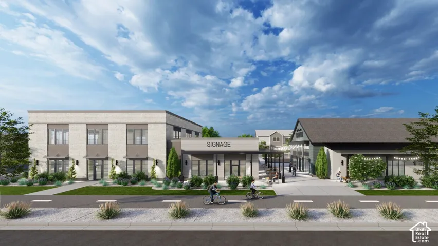 Commercial development featuring multi-story masonry construction, modern storefront glass facades, dedicated exterior signage structures, and integrated pedestrian pathways