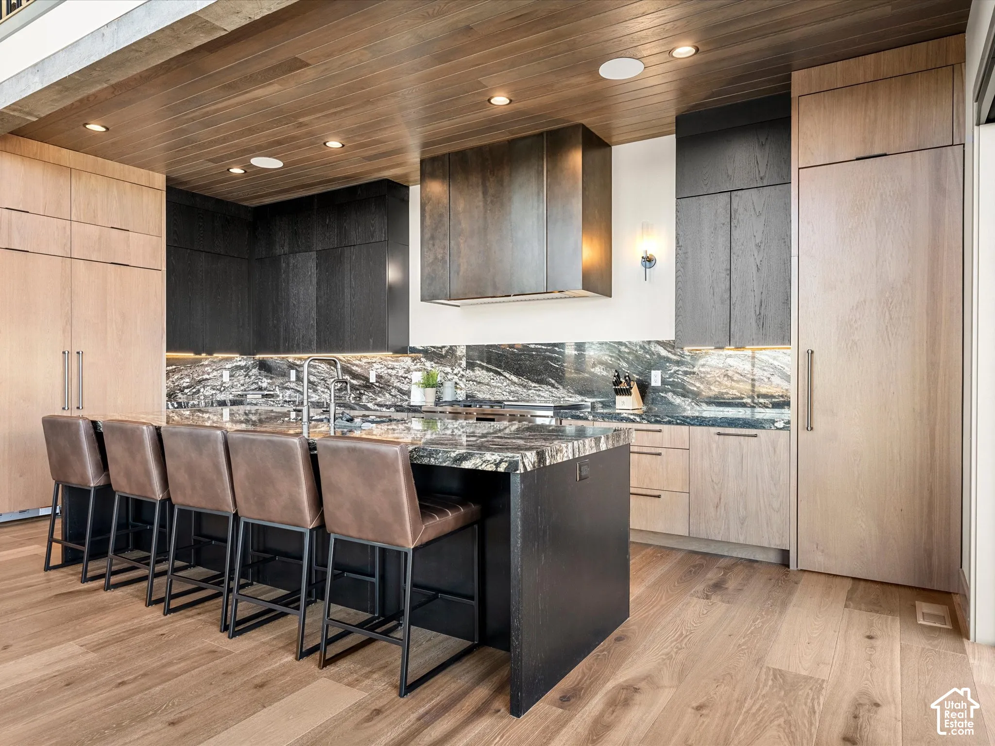 Oversized kitchen island with granite countertops