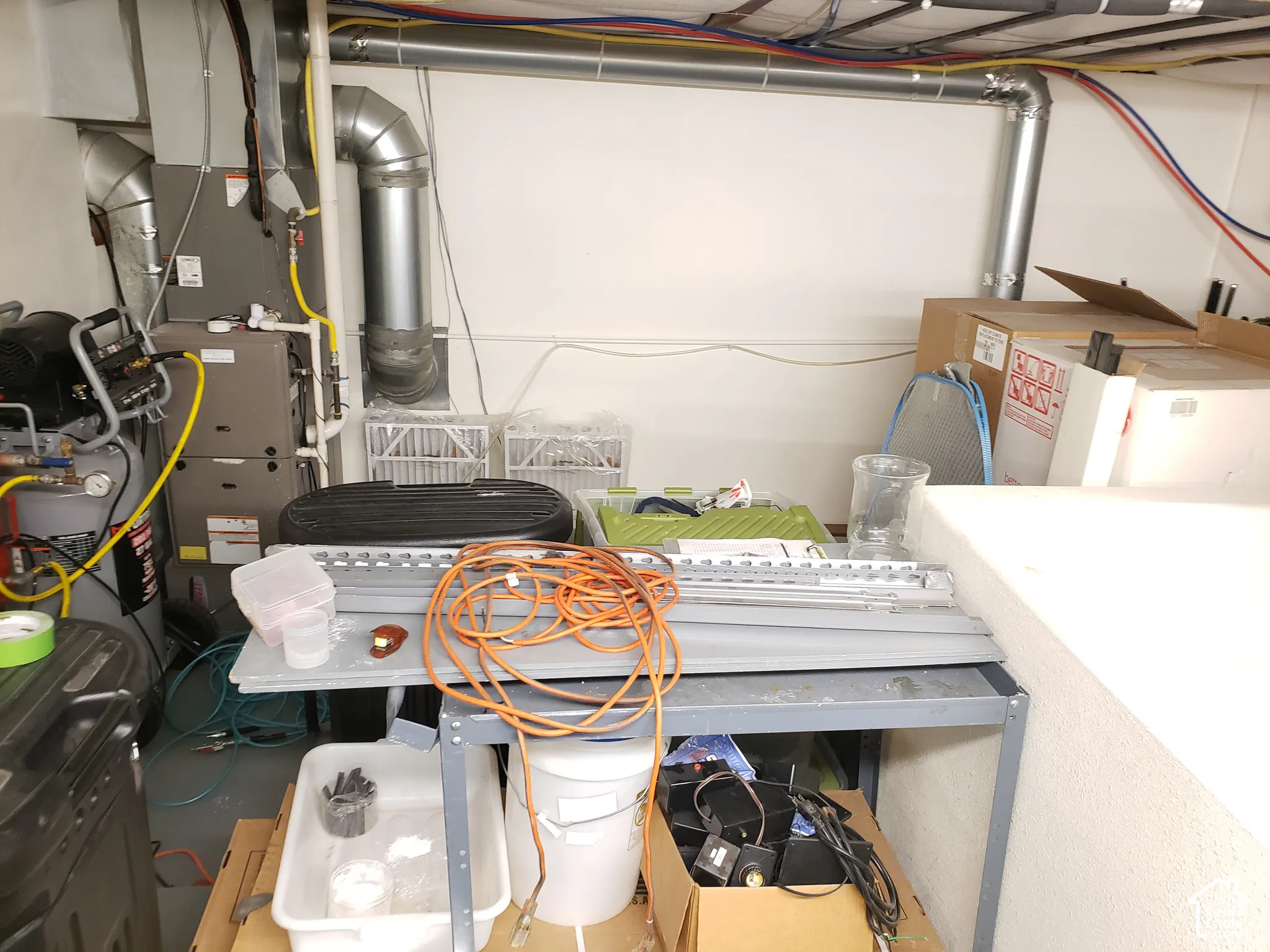 High-efficiency forced air furnace with metal ductwork