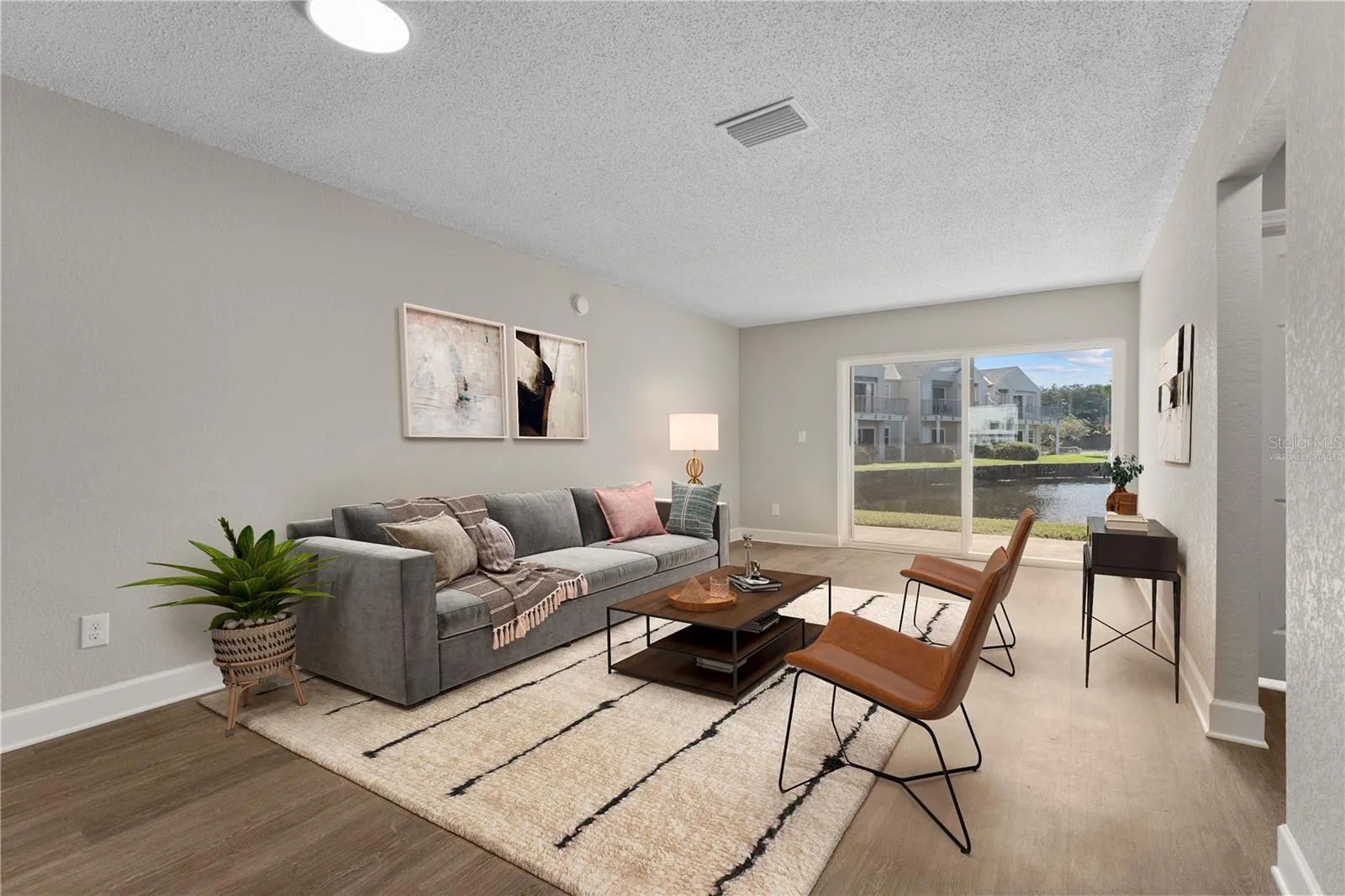 Great Room (Living + Dining) (Virtually Staged)