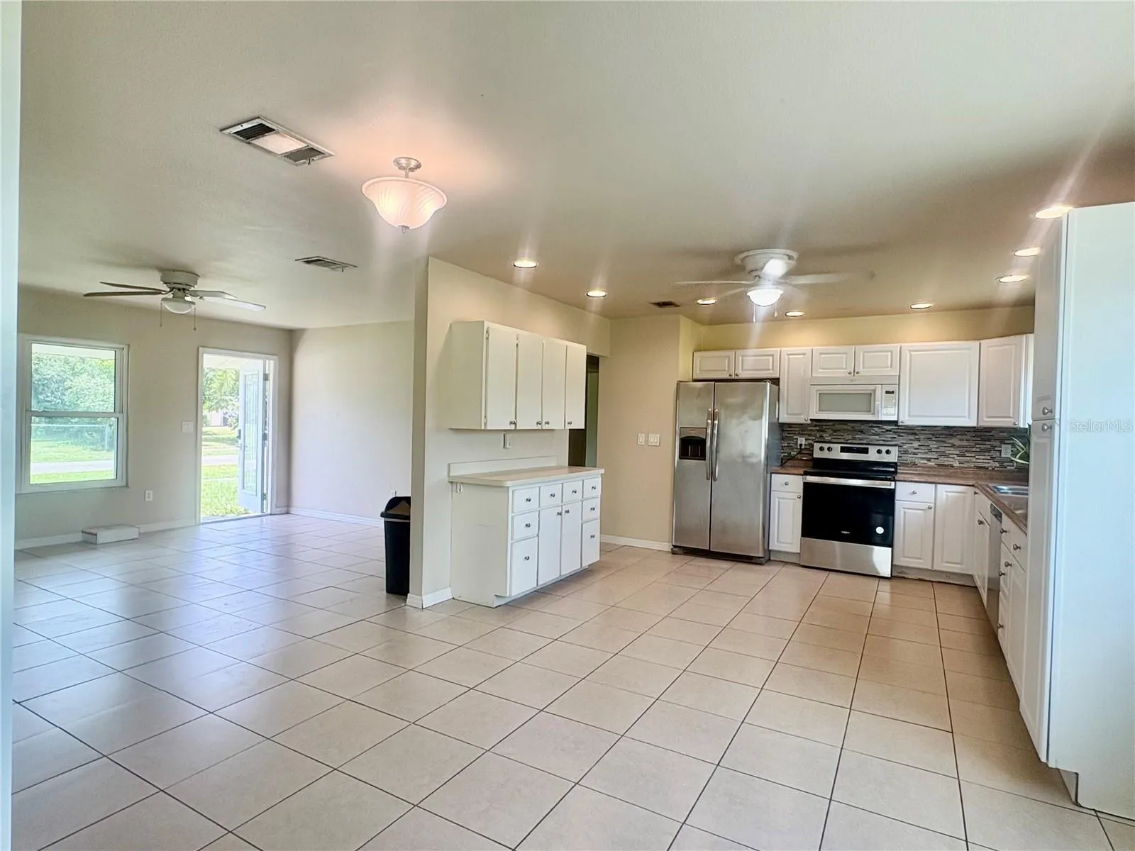 View of kitchen into living room