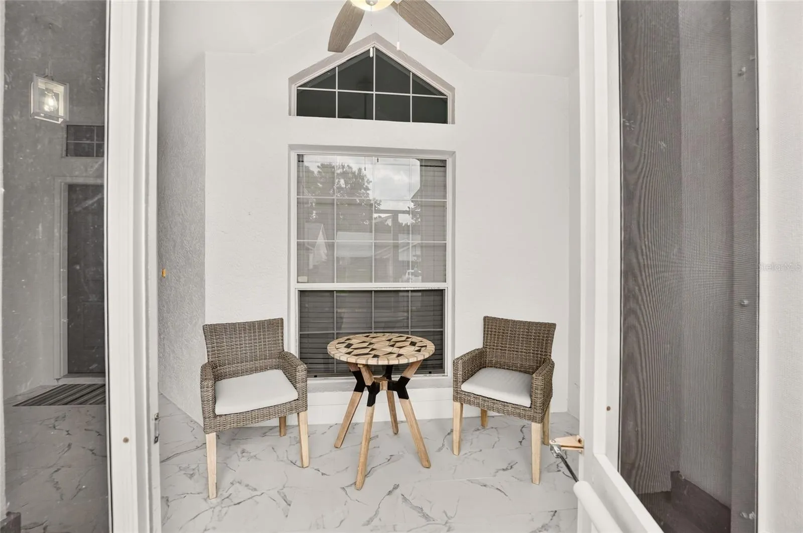 Welcoming Screened in Front Patio