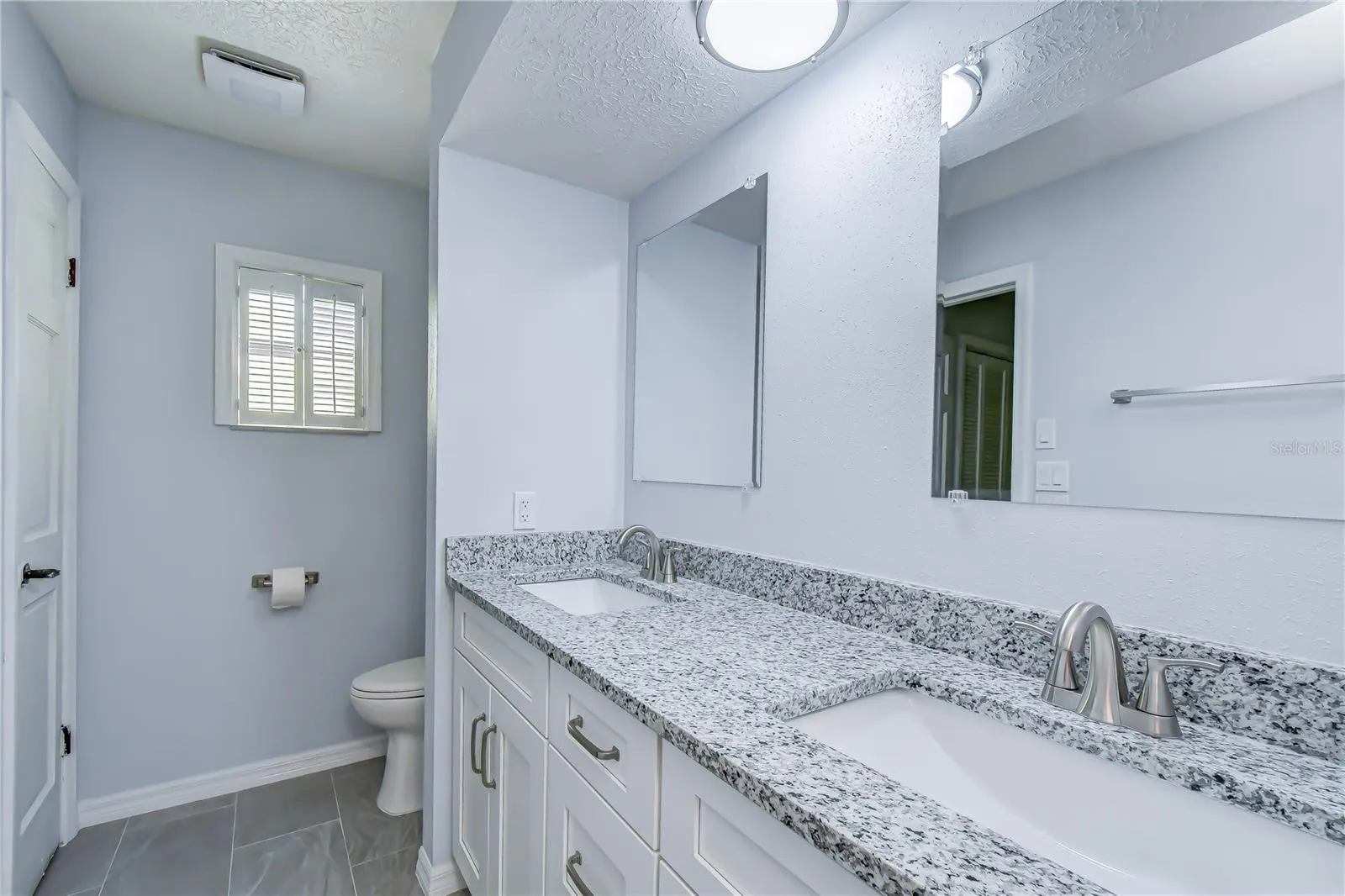 En-Suite Bathroom with dual vanity sink