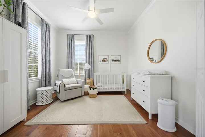 Guest room 1, originally designed as private office with French doors.