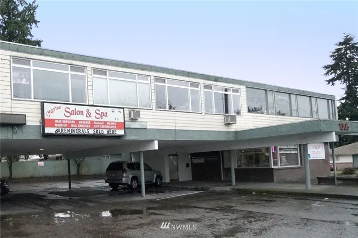 Welcome to this great opportunity to own a commercial condo that allows for a working and living space in Federal Way!