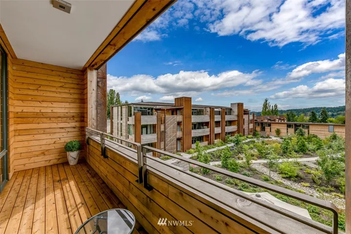 Top floor south facing covered deck allows for all year round potted gardens and lounging!