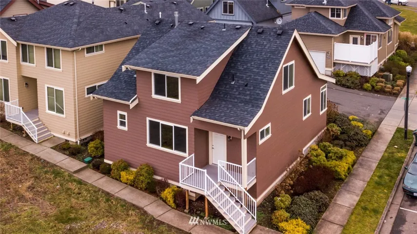 Looking down upon this lovely home situated on a corner lot that will have a park in front of it soon.