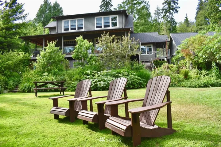 Sunny Yard shared by the main house and the cabins, with Lake Quinault Views and beautiful gardens.