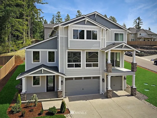 Grandview floor plan: 4 BD w/ loft, main floor Jr. Suite, sunroom w/ fireplace and deck
