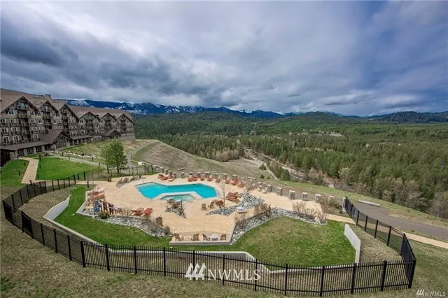 Stunning views of the Cle Elum River, Cascade Mountains to the west and of the swimming pool/Jacuzzi.