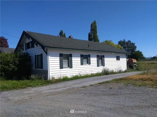 This house has great bones and plenty of parking - even an RV Pad! View from the NW corner.