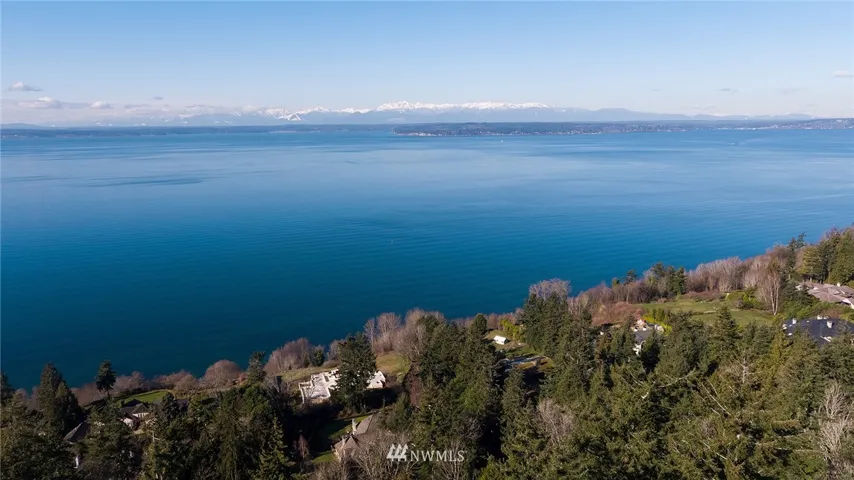 62 Madrona Lane sits in The Highlands above the Puget Sound. This is aerial shot by a drone camera standing on the lot.